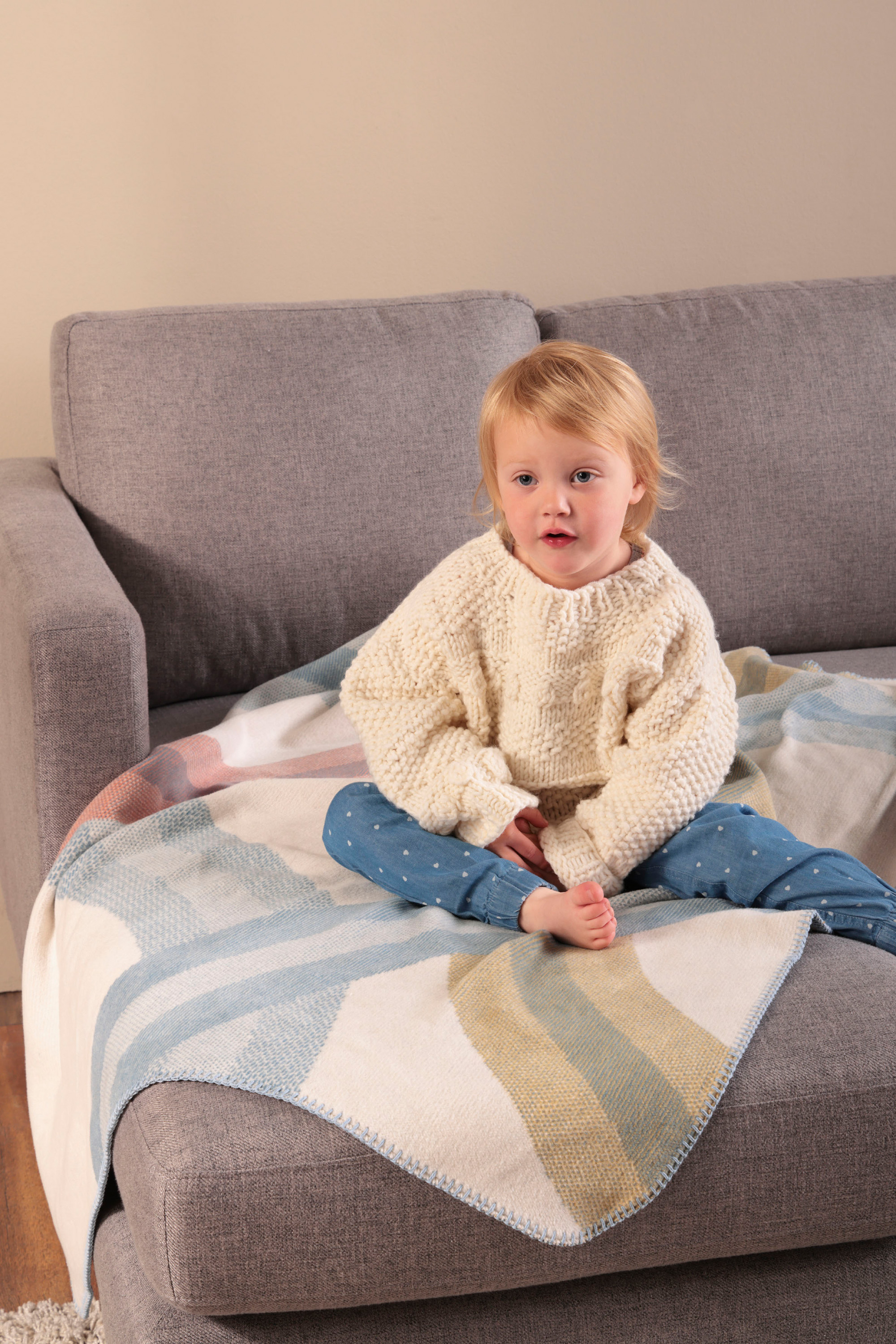 Emotionales Milieubild zur Baby-, Kinder- und Jugenddecke Turn