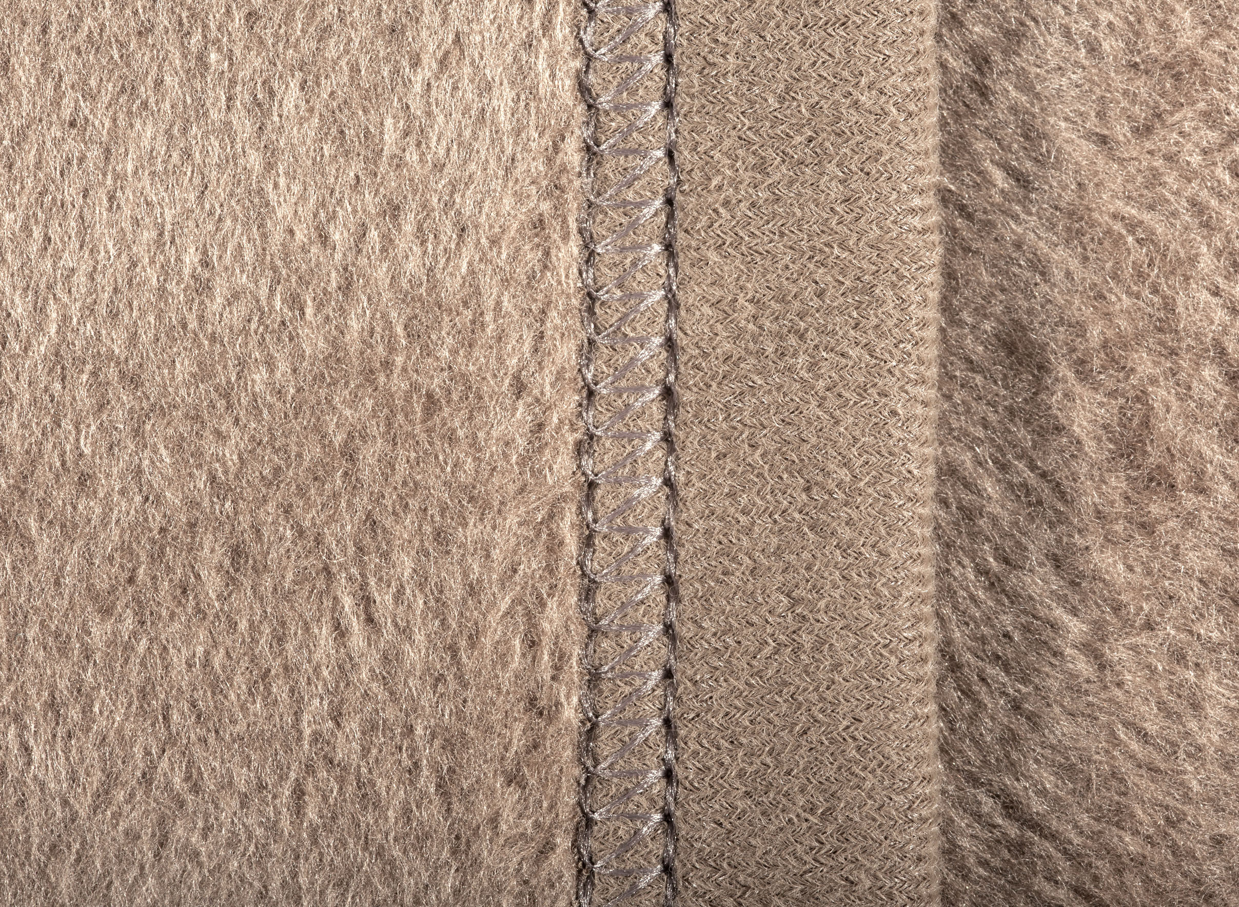 Hochwertige Wohndecke aus 100% Baumwolle in 150x200 cm in palisade Nahaufnahme Einfassung
