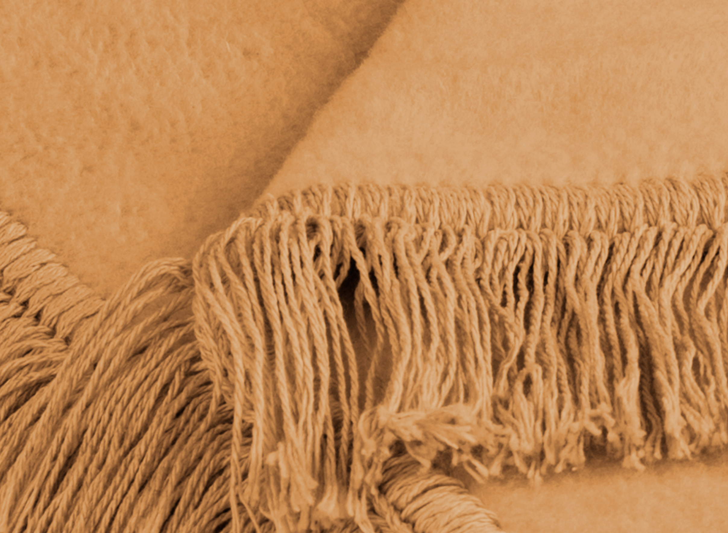 Sofa- und Sesselschoner "Cover Cotton" mit Fransen in kamel - Fransen