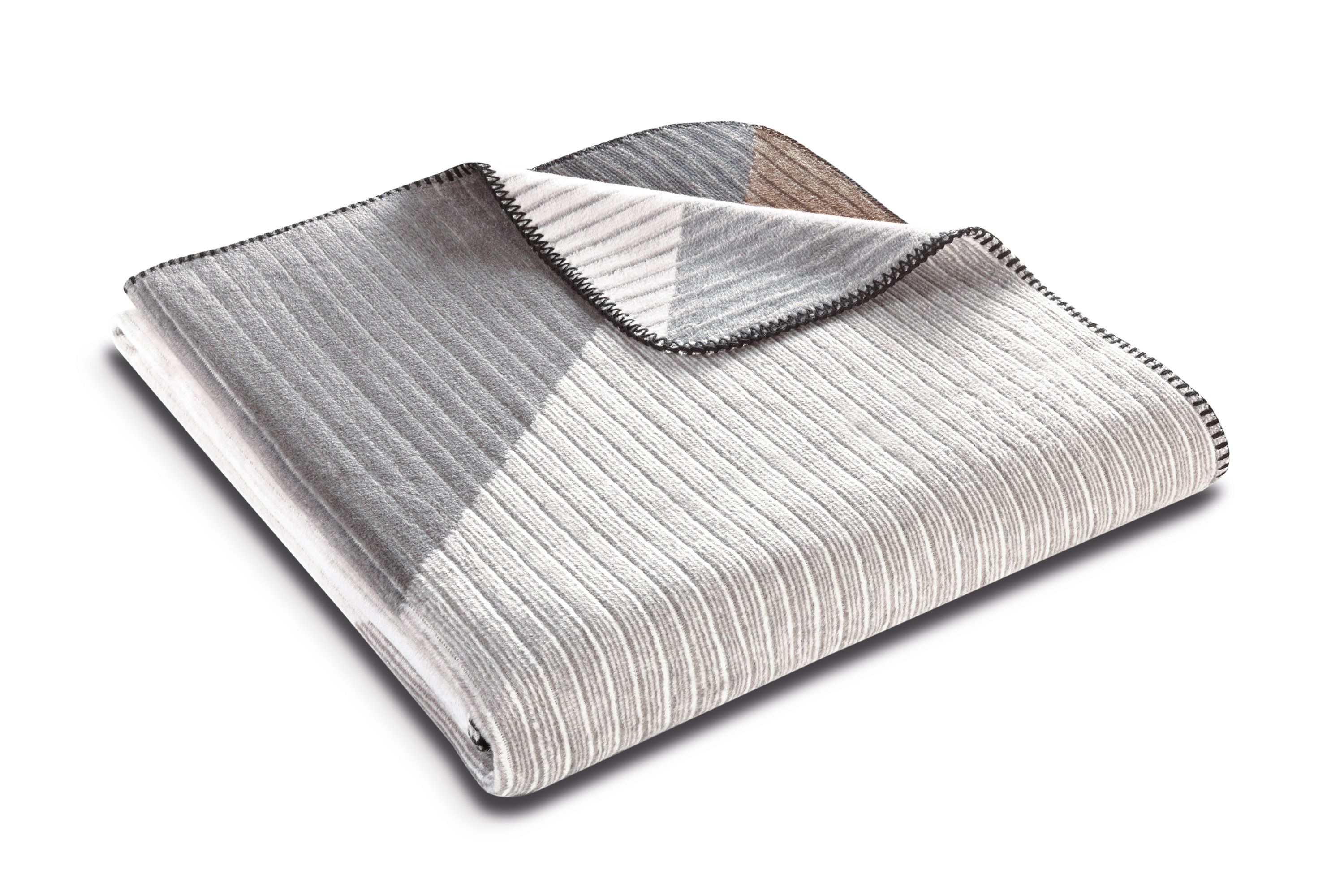 Wohndecke mit Reliefstruktur Feel Graphic Päckchenbild mit umgelegter Ecke