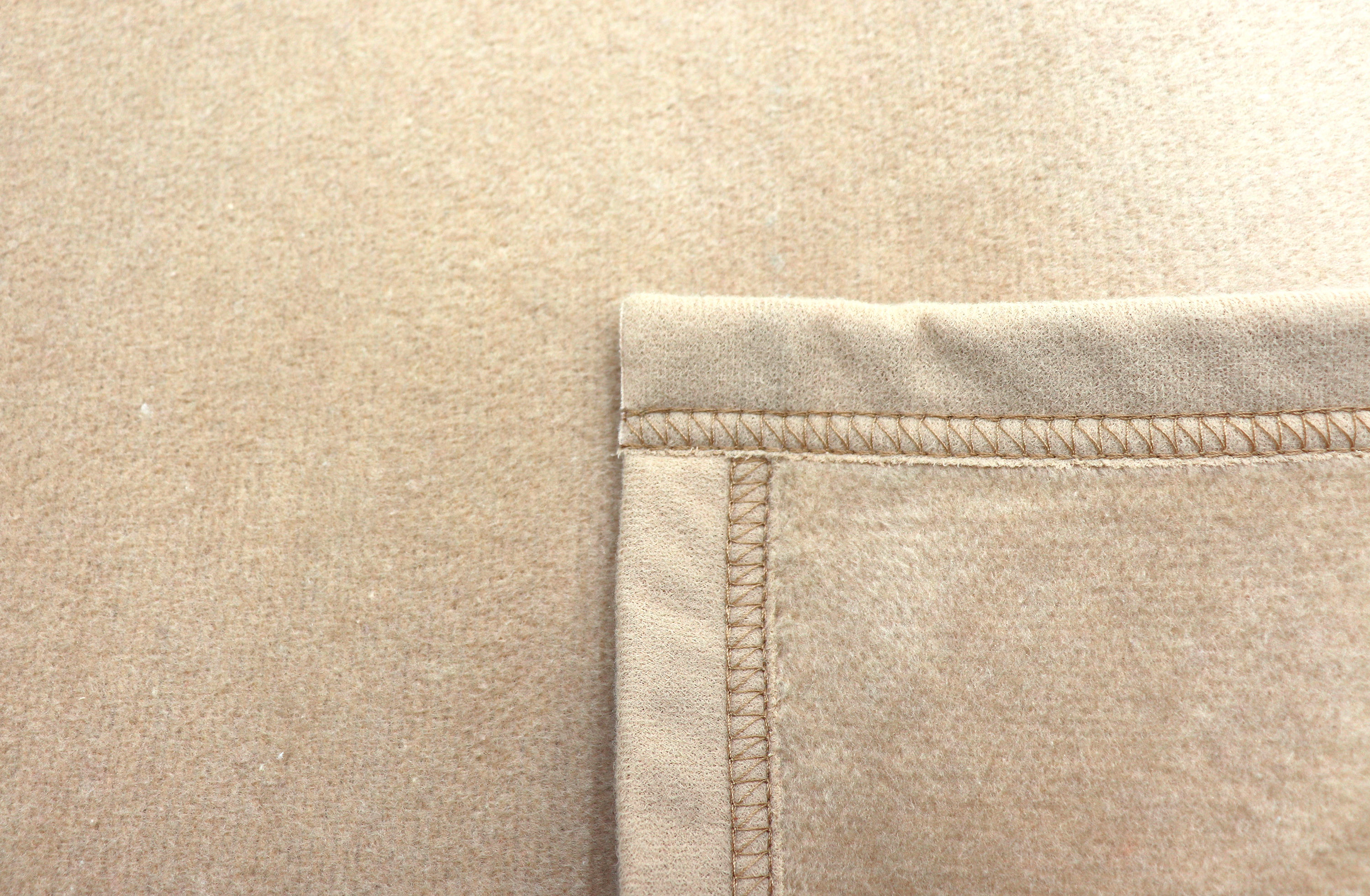 Einfarbige Wohndecke "Uno Cotton" aus Baumwollmischgewebe in Oasis/ Beige - Veloursband-Einfassung