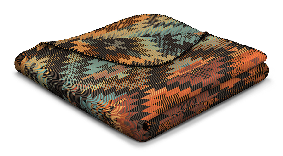 Wohndecke Nomad Glow Päckchenbild